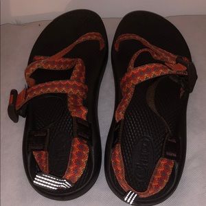 orange and brown chacos